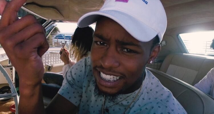 Rob $tone in music video for Rolling $tone