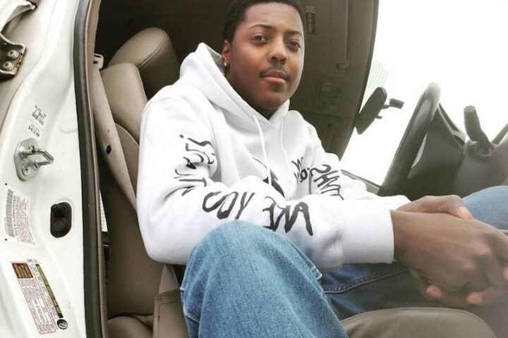 Ron Solemn press photo sitting in a car