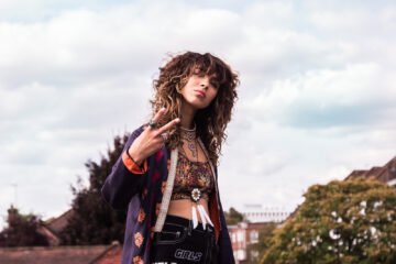 Brooke Law giving the peace sign