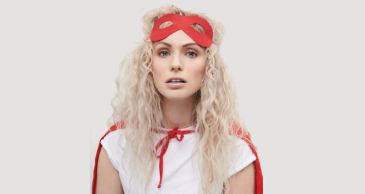 Emmi press photo with red costume