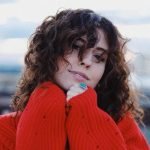 Sara Diamond wearing a red sweater