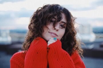 Sara Diamond wearing a red sweater