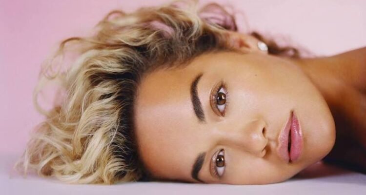 Rita Ora press photo + Phoenix album cover