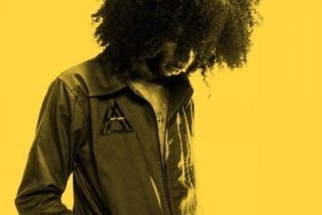 Mazi KaBi press photo with yellow background