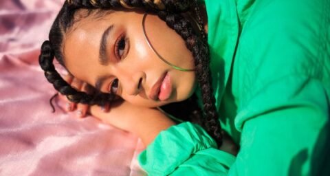 Olivia Nelson press photo lying down