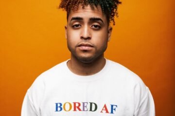 Samie Bower press photo with Bored AF sweater