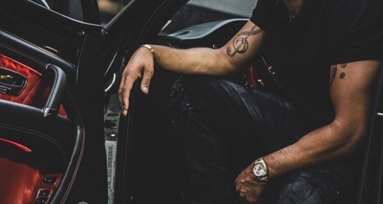 Anthony Flammia press photo sitting in a vehicle