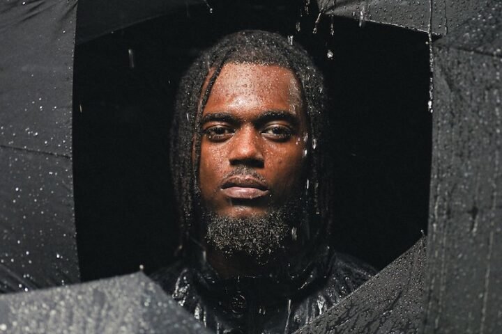 DC press photo with umbrellas