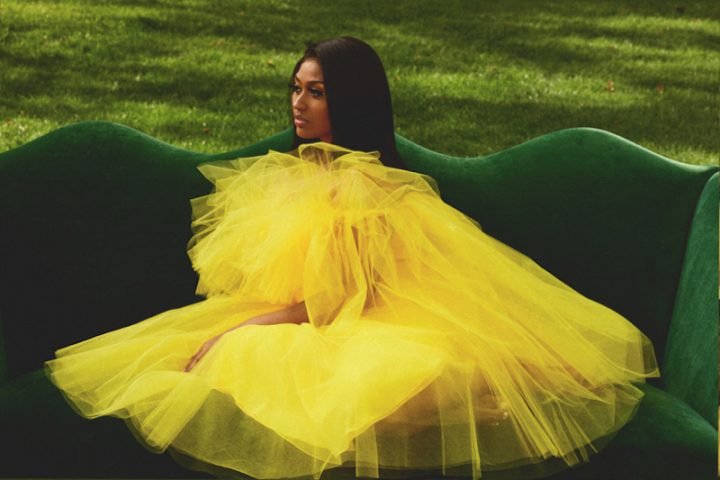 Jazmine Sullivan - “Girl Like Me” cover press photo wearing a yellow dress.
