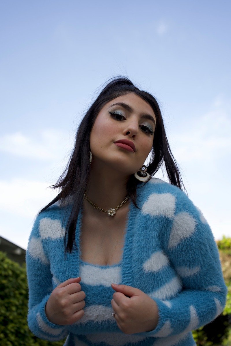 BELARO - “Grateful” press photo outside wearing a baby blue and white outfit