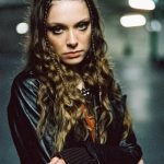 Holly Humberstone press photo wearing a black outfit