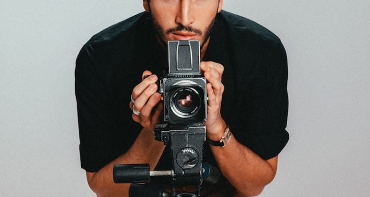 Sebastian Yatra poses for a portrait emulating Elvis Costello's iconic album cover This Year's Model at Hit Factory Studios on February 19, 2020 in Miami Florida.