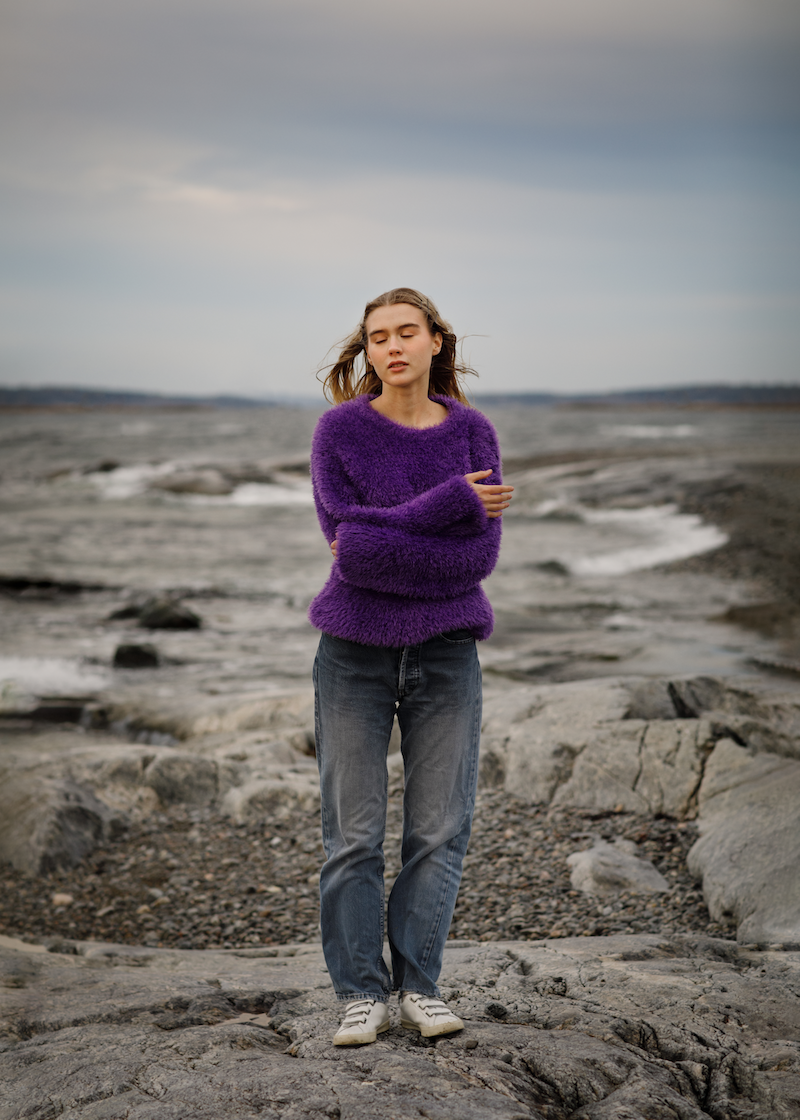 Paula Jivén press photo wearing a purple sweater