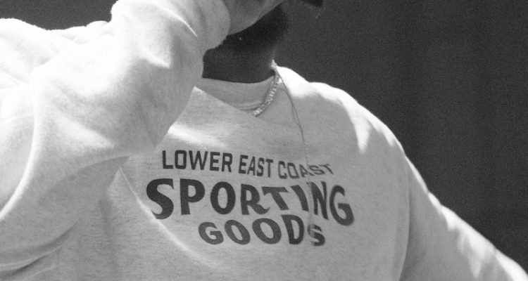 Denzel Curry press photo performing on stage