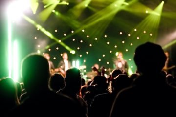 Crowd cheering at a live music concert