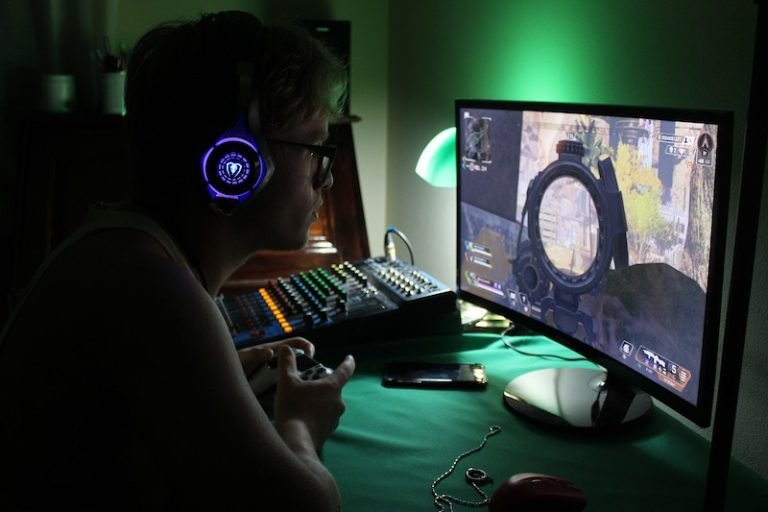 A young man playing a video game
