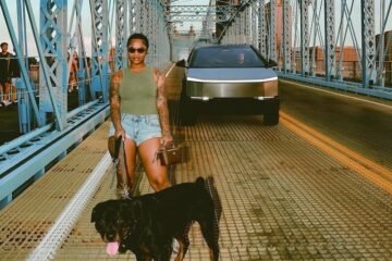 Skylar Blatt I Look Good press photo holding a dog on a leash