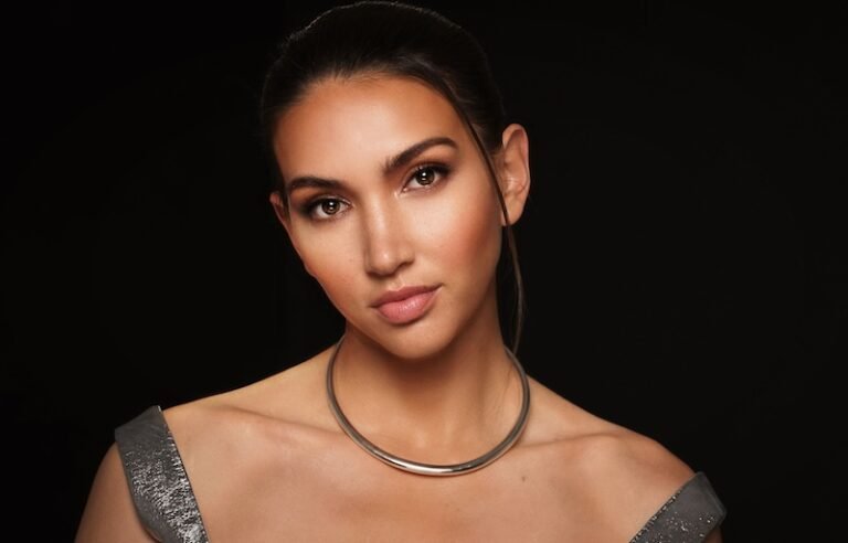 TANIS black background press photo