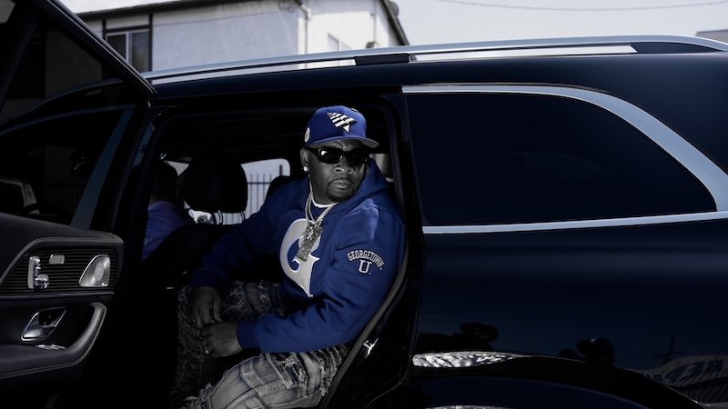 EastSide K Boy press photo with Georgetown University sweater