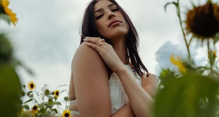 LOV press photo #1 in a field with sunflowers